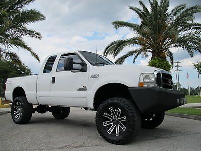 2003 ford f-250 supercab 4x4 lariat 7.3l powerstroke diesel 6" lift 37's clean!!