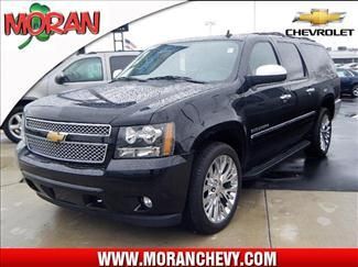 2011 chevrolet suburban ltz,22inch chrome wheels.black/black