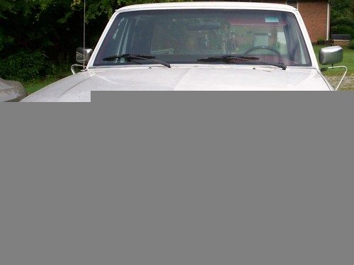 1996 ford f-150,4x4,2nd owner,5 speed manual5.0 v8,extended cab.no rust or dents