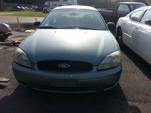 2005 green ford taurus se sedan 4-door 3.0l