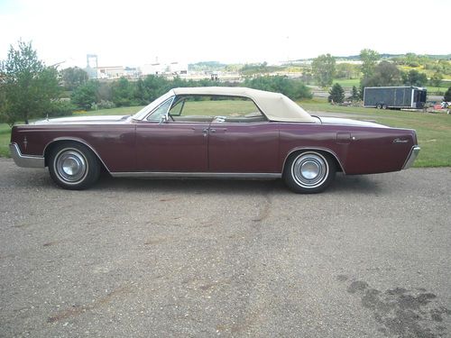 1966 lincoln continental 4-door convertible.