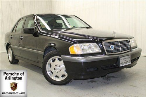 Black low miles leather, moon roof sunroof, one owner, power windows power seat