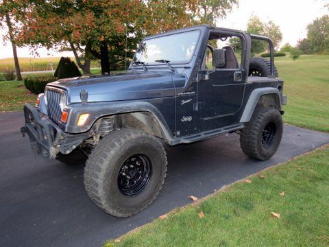 2002 jeep wrangler sport, 4x4 , 4.0l  straight 6, 5 speed, lifted 69,000 miles