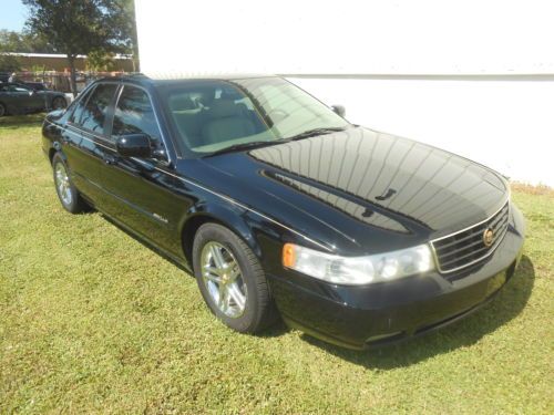 2000 seville sts factory nav  heated seats  very sharp black with chrome wheels