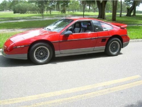 Pontiac fiero well kept, wood grain dash, financing and shipping options !!!