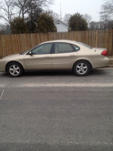 Real nice--2000 ford taurus--gl--4dsd--6 cyl--leather--am /fm radio--automatic