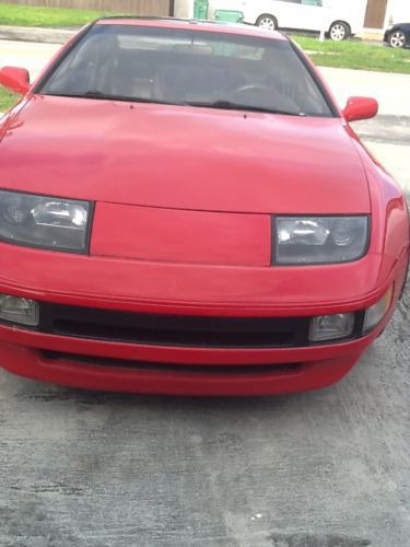 1990 z red, t-tops, 5spd, good condition, low mileage, custom stereo