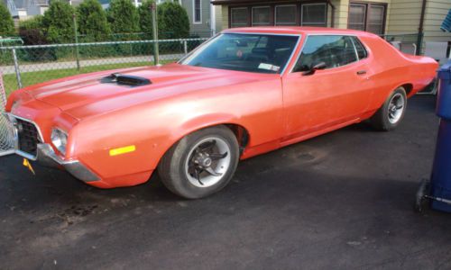 Orange 72 torino, good condition, sedan 2 dr.