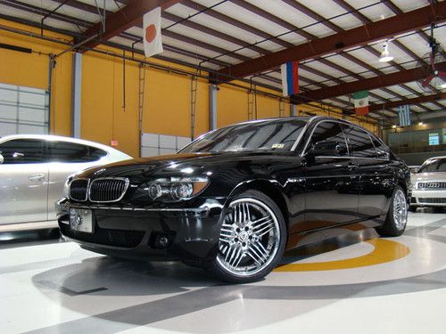 760li, triple black, absolutely perfect with 100 miles on new tires!