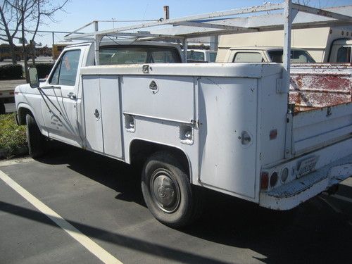1984 ford f-250 3/4-ton pickup with utility box and rack