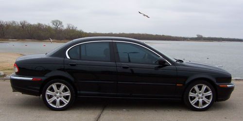 2003 jaguar x-type with 3.0 liter v/6 all wheel drive drives great priced right