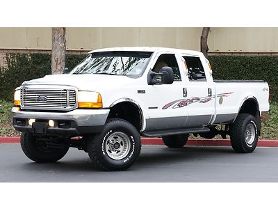 1-owner * lift'd crew cab long bed lariat 7.3l powerstroke 84k miles .. mint!!