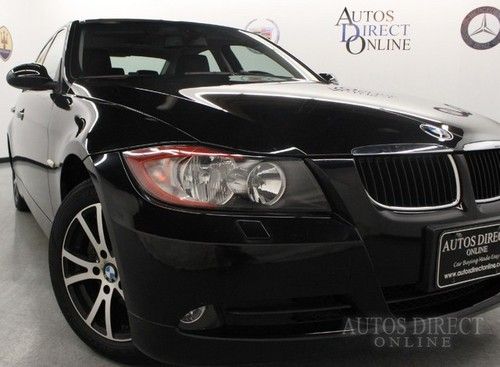 We finance 07 328xi awd 6-speed sunroof low miles leather heated seats cd stereo
