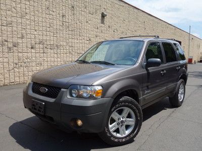 Ford escape hybrid 4wd gas saver 6 cd changer free autocheck no reserve