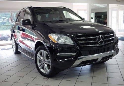 Beautiful ml350 rwd pano roof keyless premium 1 nav heated seats 9k miles