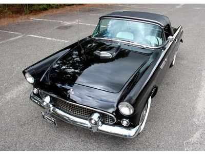 Beautiful 55 thunderbird raven black with black and white interior nice cruiser!