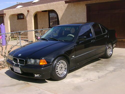 Clean black 1994 bmw 325i runs fantastic black leather chrome wheels cold a/c