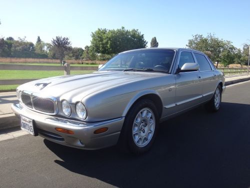1998 66k miles silver exterior/black leather interior, well maintained