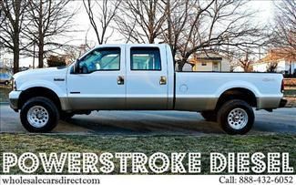 Used ford f 250 crew cab powerstroke turbo diesel 4x4 pickup trucks we finance