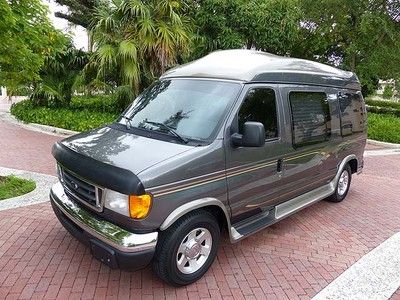 Excellent 2004 ford e150 hi top conversion - dvd, power bed, more - very clean
