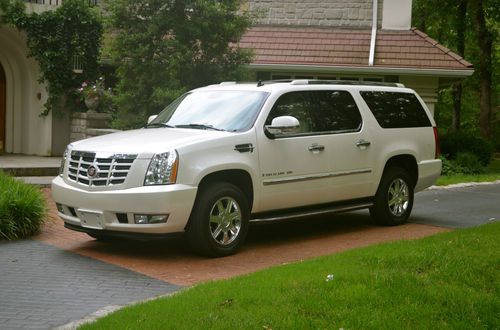 Pearl white, awd, beautiful, clean 4-door suv 6.2l no reserve auction