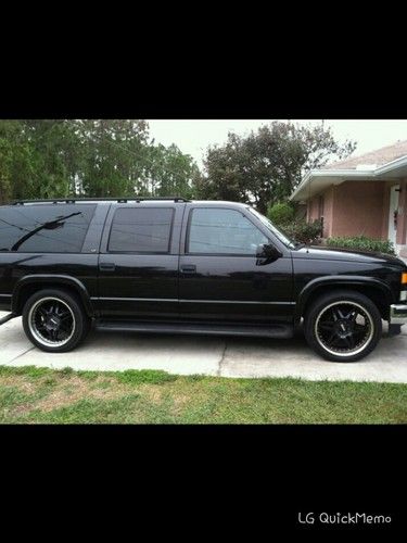 1997 chevy suburban black and aluminum 22 inch rims  3rd row leather seating