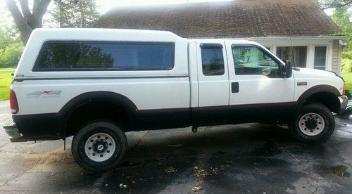 1999 white f250 xlt 4x4 super cab good condition