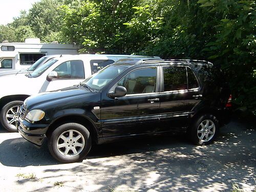 Mercedes ml430 very rusty runs rough high miles rebuild or great parts truck !!!