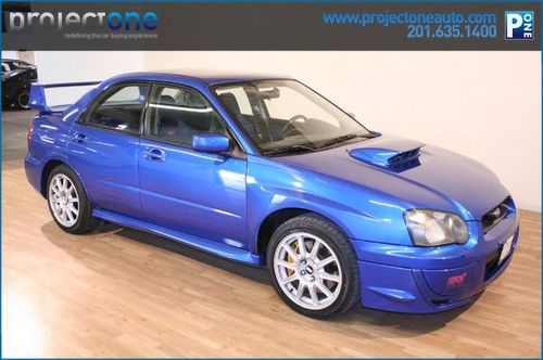 Sti 27k miles blue clean carfax