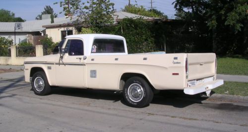 No reserve.1971 dodge truck d100,4 spd,v8,5.2 l, daily driver..