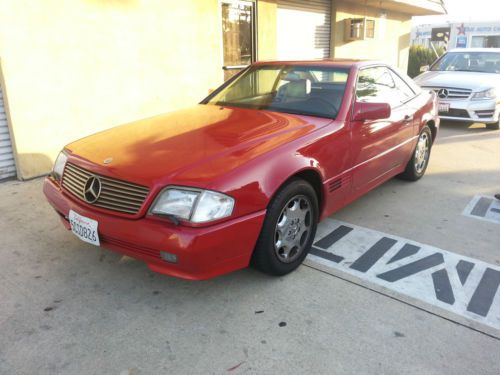 500sl , 135,000 miles, hard, soft tops, excellent condition, red, beige interior