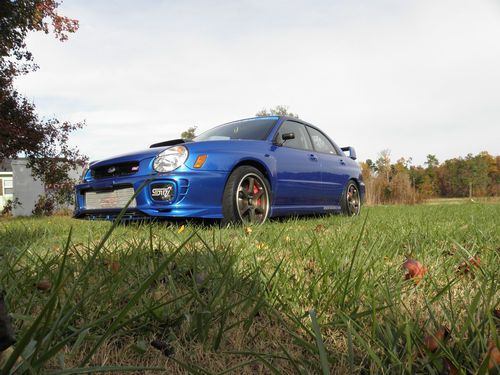 2002 subaru wrx, one owner, custom and very low miles, fast and reliable.