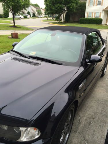 2004 m3 convertible.  6 speed manual.  dark blue, black heated leather and top.