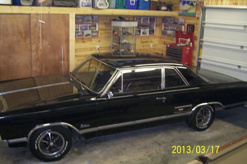 Excellent condition black,cutlass sports coupe 442 drive it home