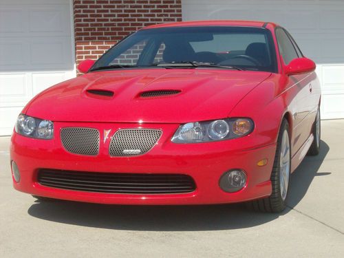 2006 gto like new 7365 actual miles 6.0 auto red/black