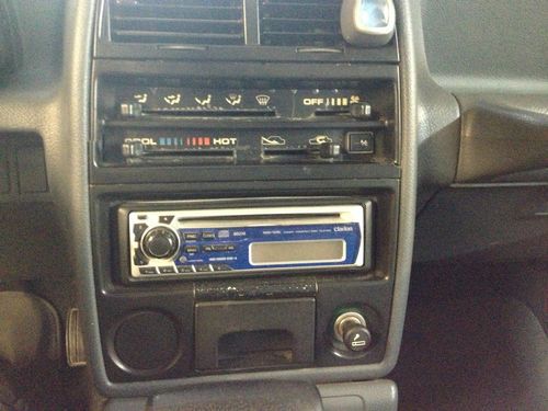 1991 Chevrolet Geo Tracker Auto Air 4x4 soft top, image 4