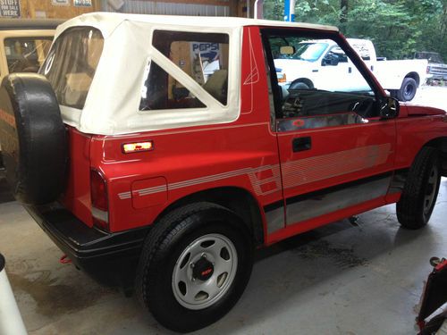 1991 Chevrolet Geo Tracker Auto Air 4x4 soft top, image 11