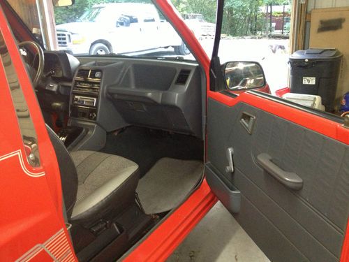 1991 Chevrolet Geo Tracker Auto Air 4x4 soft top, image 12
