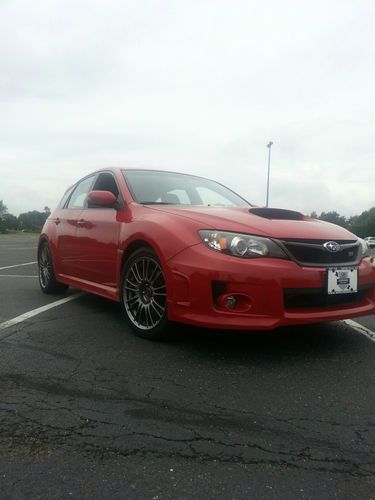 2011 red subaru impreza wrx sti