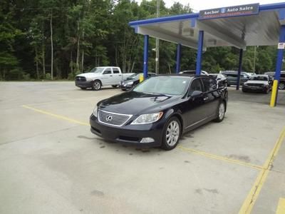 Dark blue lexus ls 460 with a tan interior luxury model with navigation leather