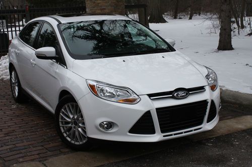 2012 focus sel.no reserve.leather/navi/moonroof/sensors/sync/fog lights/rebuilt