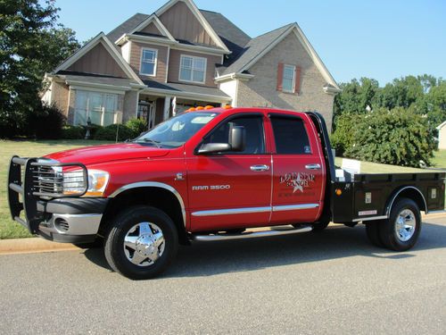 2006 dodge ram 4x4 3500,6 speed,5.9 cummins,crew cab,with flatbed,new wheels