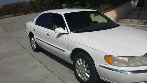 1999 lincoln continental base sedan 4-door 4.6l white