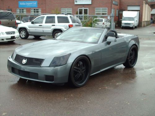 2004 cadillac xlr convertible 2-door 4.6l 22 inch black wheels runs great!!!