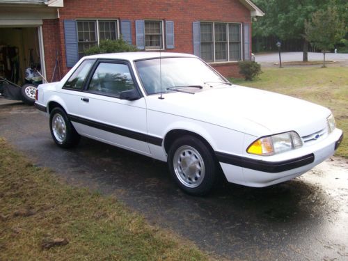 1991 ford mustang lx coupe 2-door 2.3l at  45k miles white w/blue interior nice!