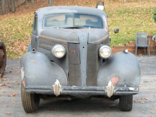 1937  buick  four door sedan  for parts or restoration