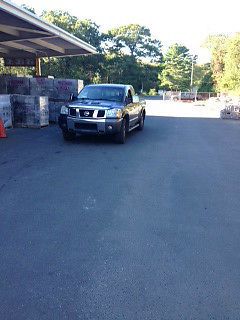 2004 Nissan Titan SE Extended Cab King Cab 4WD Pickup, image 2