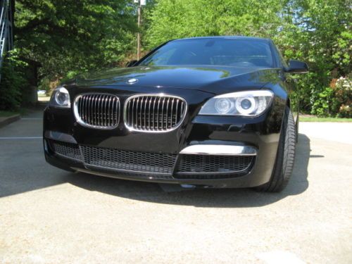 750 li m sport.  100,000 mile warranty, black/black, heads up display,  camera.