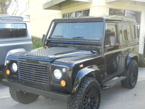 1997 land rover defender 90 autosport black series upgraded interior and wheels.