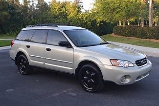 2006 subaru outback awd silver pearl, in dash dvd/nav, sporty rims, no reserve.